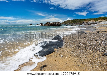 On the beautiful beach at Dollar Cove Gunwalloe Cornwall England UK Europe