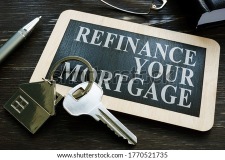 Refinance your mortgage word on the small blackboard. Royalty-Free Stock Photo #1770521735