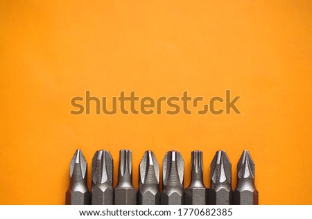 Close up photo of Drill bit set 8 type on red background