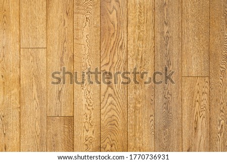 Close-up of engineered oak floorboards. Wood background Royalty-Free Stock Photo #1770736931