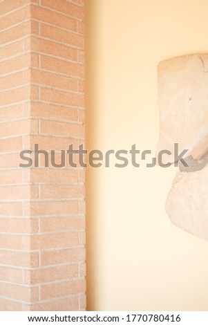
Stylized marble on yellow background with column