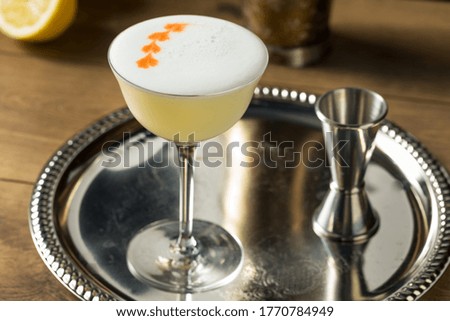 Sweet Boozy Whiskey Pisco Sour with Lemon and Angastora