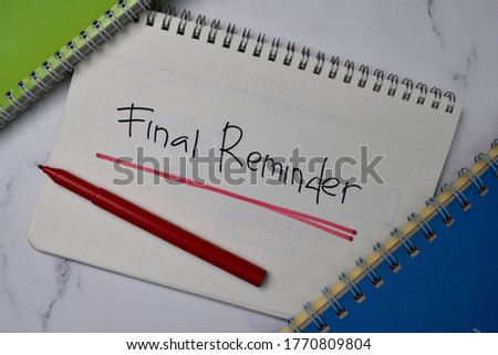 Final Reminder write on a book isolated wooden table.