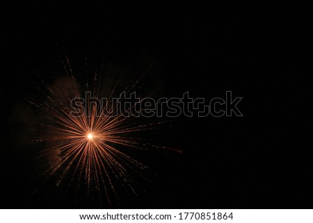 4th of July fireworks against a black night sky