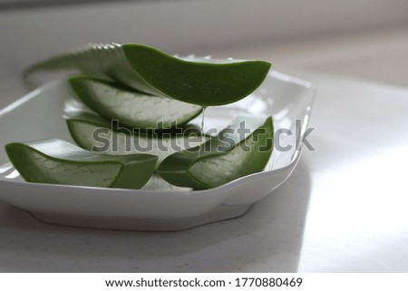 Slices of Aloe Vera in a white plate