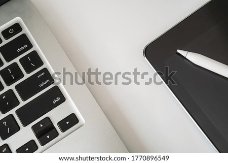 Flat lay composition with laptop and tablet on white background. Home office