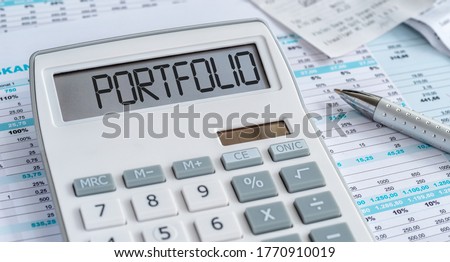 A calculator with the word Portfolio on the display Royalty-Free Stock Photo #1770910019