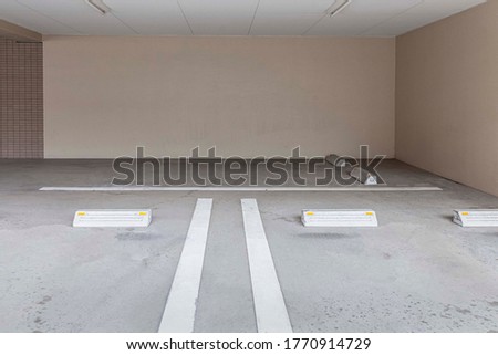 Empty space car park interior at office building