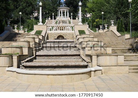Staircase in an urban environment. Symbol of success, toned background. Empty city without people.
