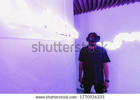 Mixed Reality MR . Man is connected to digital reality. Cyber room. High quality photo