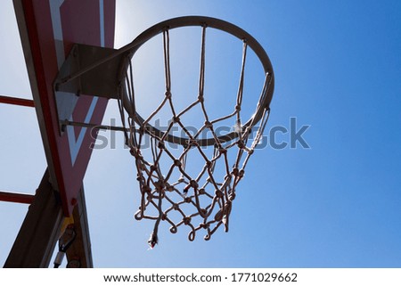 Basketball hoop against blue sky. Basketball hoop. 
