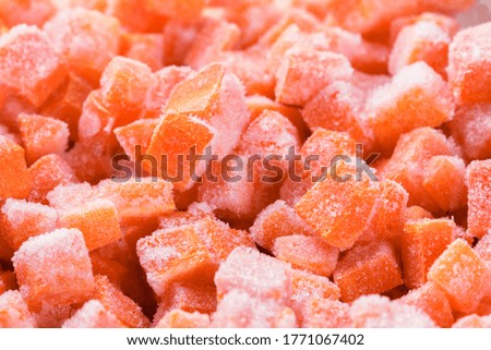 Frozen raw carrot background and orange fresh food,  group.