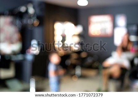 Hairdresser saloon background ( real business ). Unfocussed image