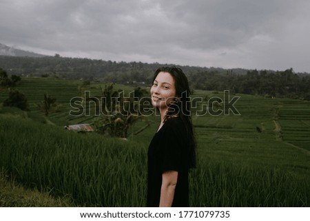 woman in black dress in rice terraces Bali