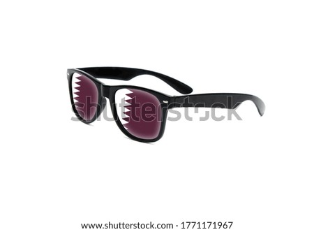 Qatar flag printed sunglasses isolated on white background close-up