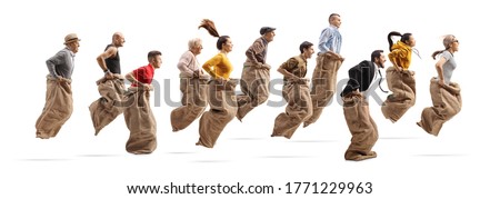 Profile shot of many people playing a gunny race and jumping with sacks isolated on white background Royalty-Free Stock Photo #1771229963