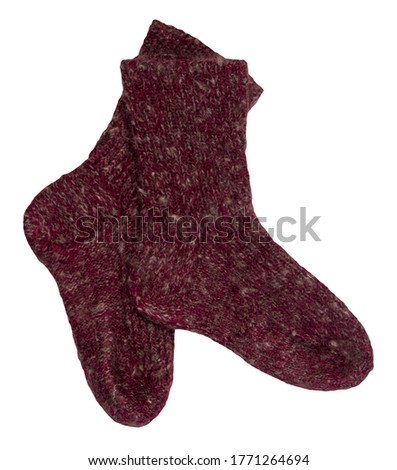 woolen burgundy socks isolated on a white background. winter accessories.socks top view