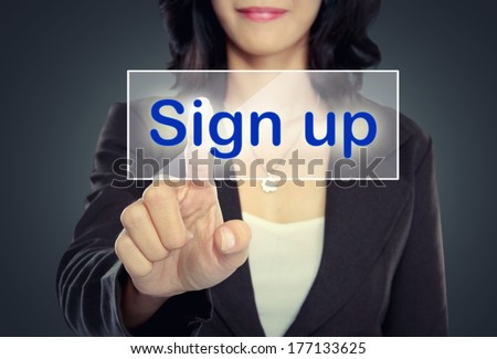 woman push to  Sign Up button on virtual screen