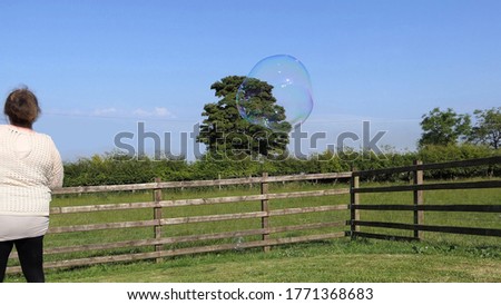 Giant Soap Bubble with a Bubble wand