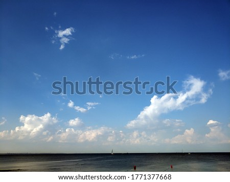 beautiful clouds over the sea near the skyline