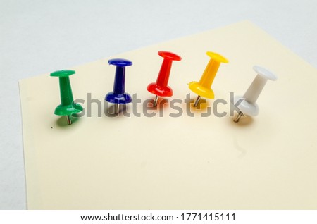 Macro photo of colored pins