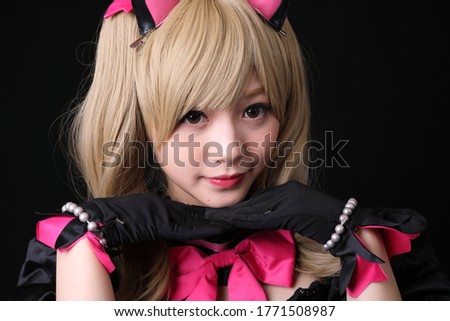 Portrait of Japan anime cosplay girl isolated in black background