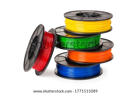 red, blue, green, orange, yellow filament for 3d printer isolated on white background Royalty-Free Stock Photo #1771515089
