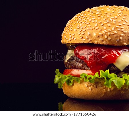 close up burger, french fries, tomato catch up