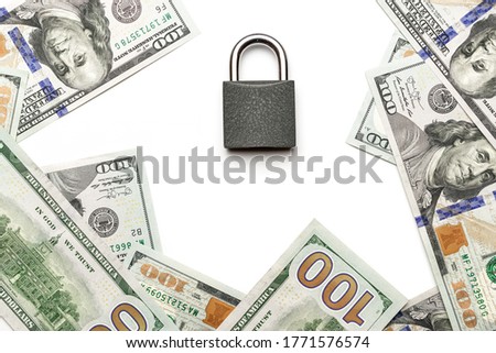 Save money concept. Washington American cash with padlock isolated on white. Usd money background.