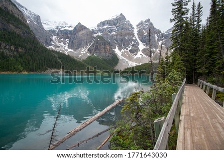 A picture of Moraine lake seen from a small bridge.   AB Canada
