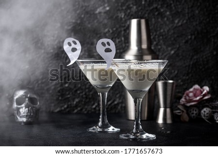 Halloween cocktail Liquid ghost. Coconut martini drink