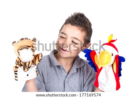 Creative child with puppets Royalty-Free Stock Photo #177169574