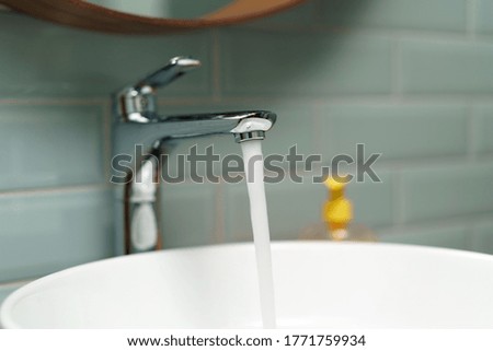 Modern bathroom interior with white ceramic sink