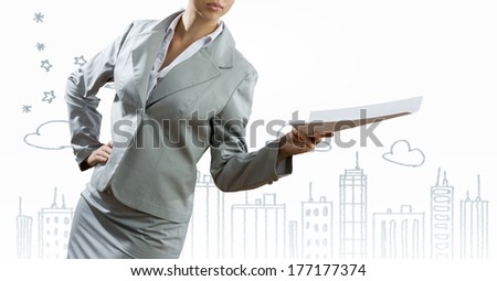 Businesswoman against sketch background. New idea and strategy
