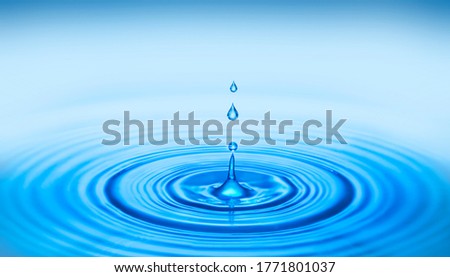water drop and splash blue water