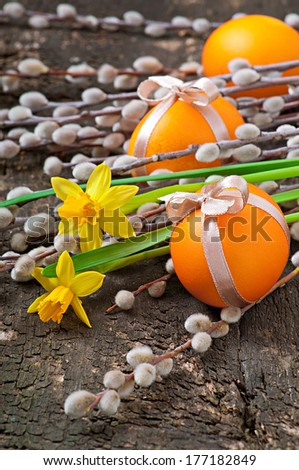 Colorful easter eggs on old wooden background