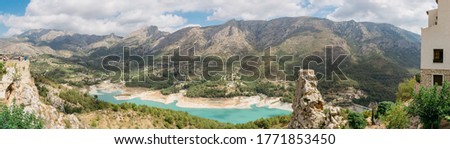 Guadalest in Spain. Panoramic views of the mountains, lake and c