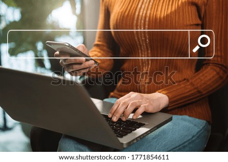 Searching Browsing Internet Data Information with blank search bar.business working with smart phone, tablet and laptop in office. Networking Concept 
