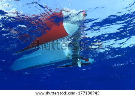Rubber boat on the surface in the red sea