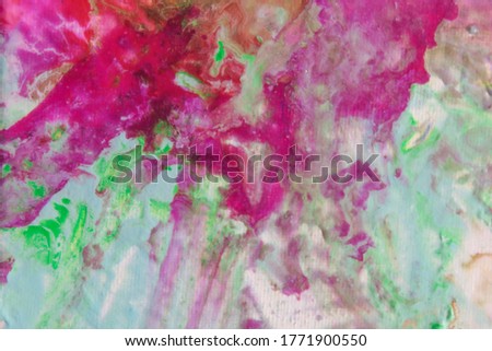 Abstract artistic background with spots of acrylic paint in various spring colors