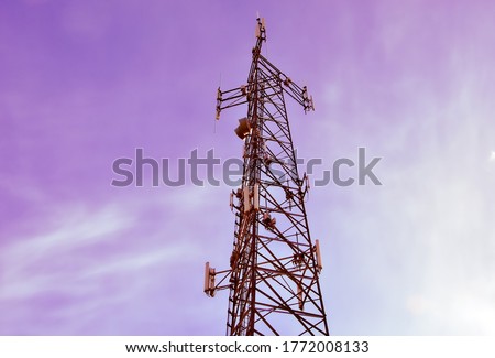 Telecommunication tower in purple sky