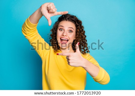 Close-up portrait of her she nice attractive cheerful cheery glad wavy-haired girl showing frame having fun enjoying leisure isolated over bright vivid shine vibrant blue color background