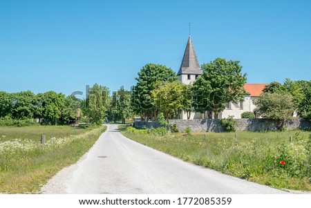 Bunge church is a medieval countryside church on Swedish Baltic sea island Gotland dating back to the 13th century. Gotalnd is famous for its medieval churches. Royalty-Free Stock Photo #1772085359