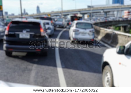  Fuzzy, Blurry picture of a traffic jam on Bangkok's special expressway.                                  