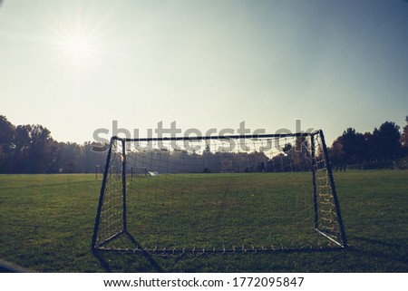 Abadoned village football stadion currently inactive. Captured in spring sunset, clear sky