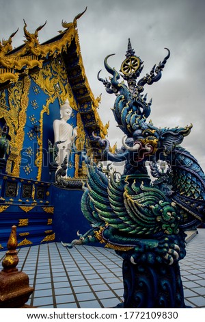 Wat Rong Suea Ten or The Blue Temple translates as House of the dancing tiger A monumental, modern Buddhist temple distinguished by its vivid blue coloring & elaborate carvings in Chiang Rai Province