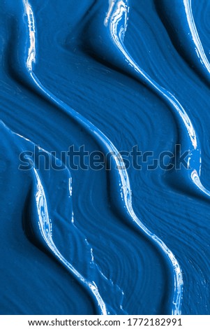Paint applied thick strokes textured canvas surface. Classic Blue color