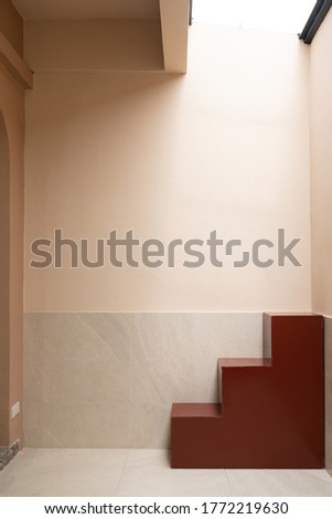 Minimal empty space scene with red stair and pink wall in shade for photoshoot / studio concept / outdoor studio / modern minimal style