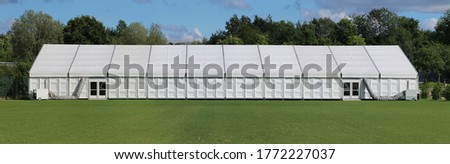 large white tent for fairs and events Royalty-Free Stock Photo #1772227037