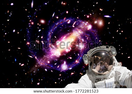 Astronaut against deep space. The elements of this image furnished by NASA.
